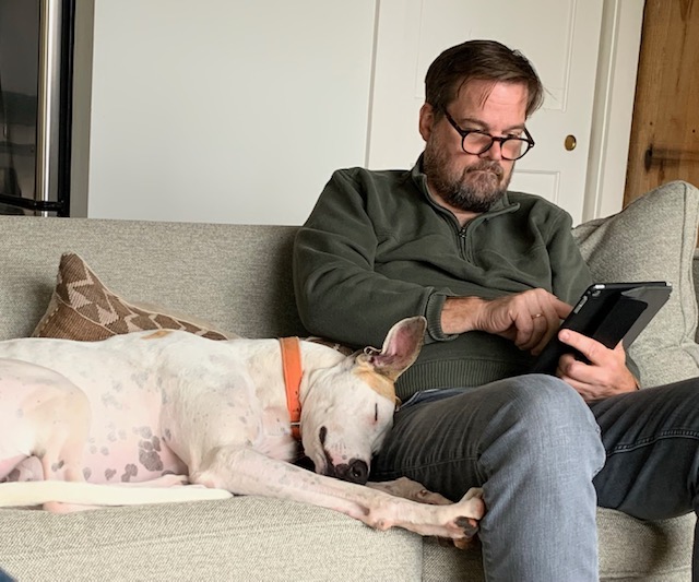 dog and man relaxing together