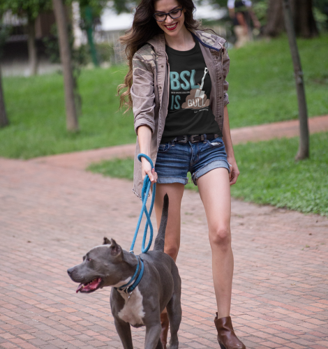 pretty-woman-walking-the-dog-wearing-a-t-shirt-mockup-at-the-park-a17354